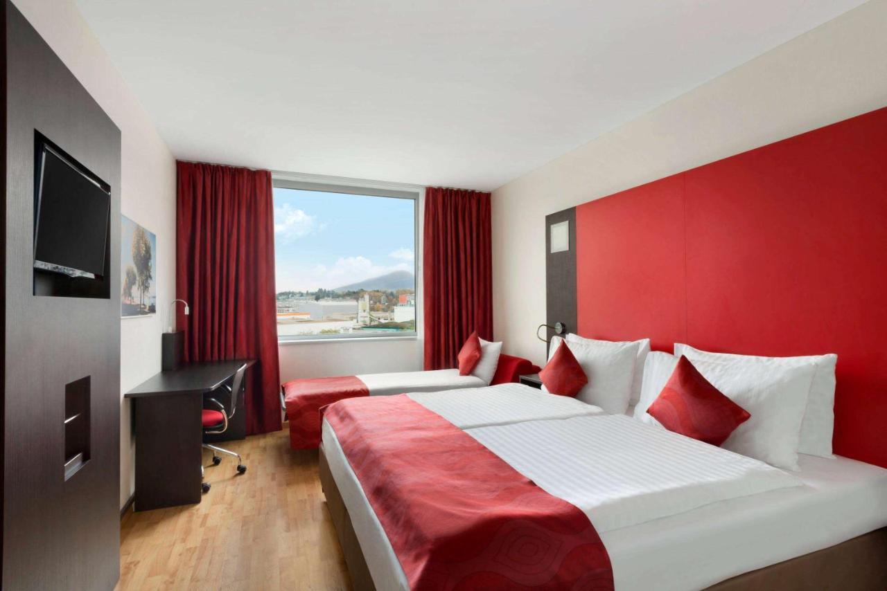 Ramada Encore By Wyndham Geneva Carouge Exterior photo